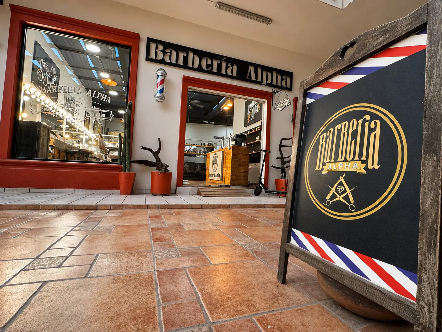 Entrada y letrero de Alpha Barber 2